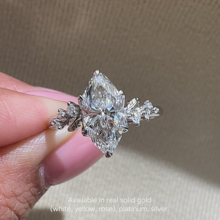 Diamondsbyuk marquise ring with nature inspired style.

