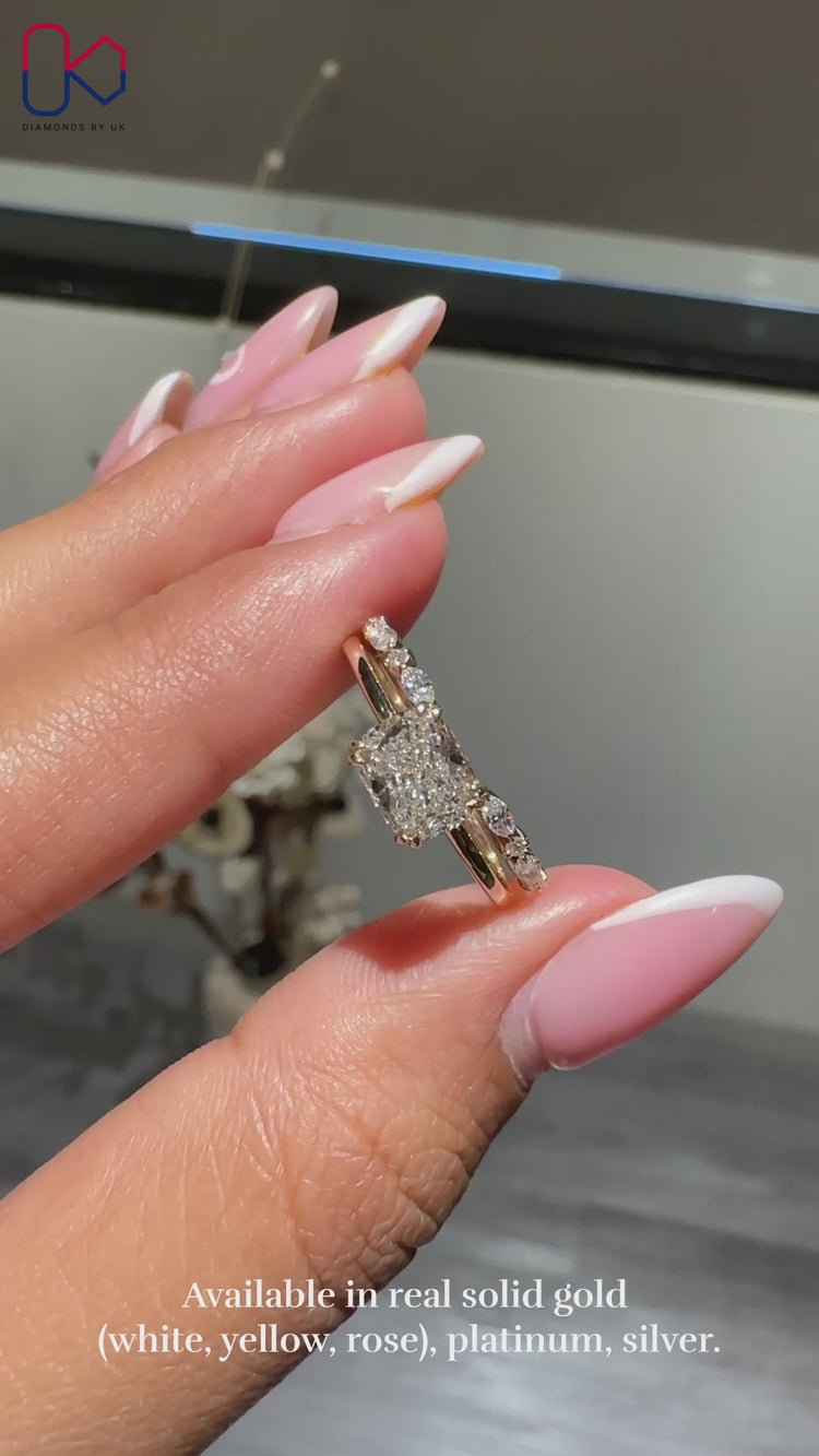 Solitaire setting ring with a polished yellow gold band.
