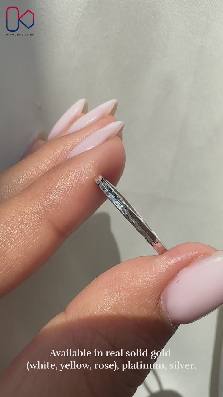 Simple wedding band in white gold wedding band.
