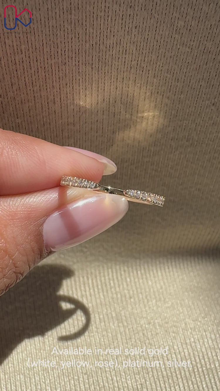 Handmade lab grown diamond band with an open gap.