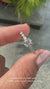 White gold ring with round cut diamond and vintage milgrain detail.
