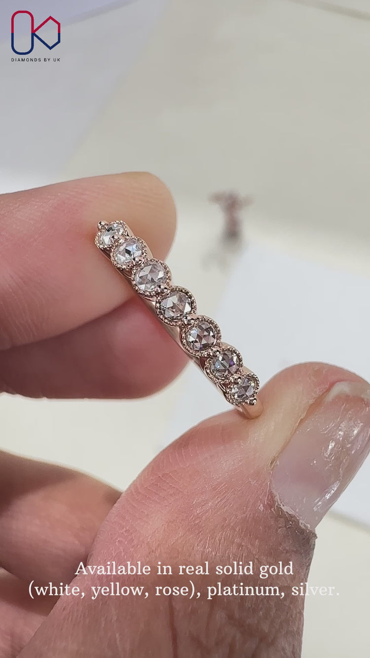 Stunning bezel wedding band showcasing timeless and refined craftsmanship.