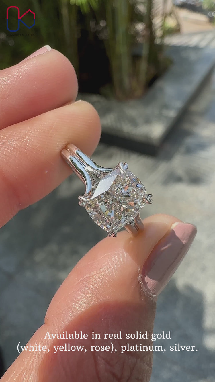 Split shank ring featuring a stunning peekaboo diamond ring.