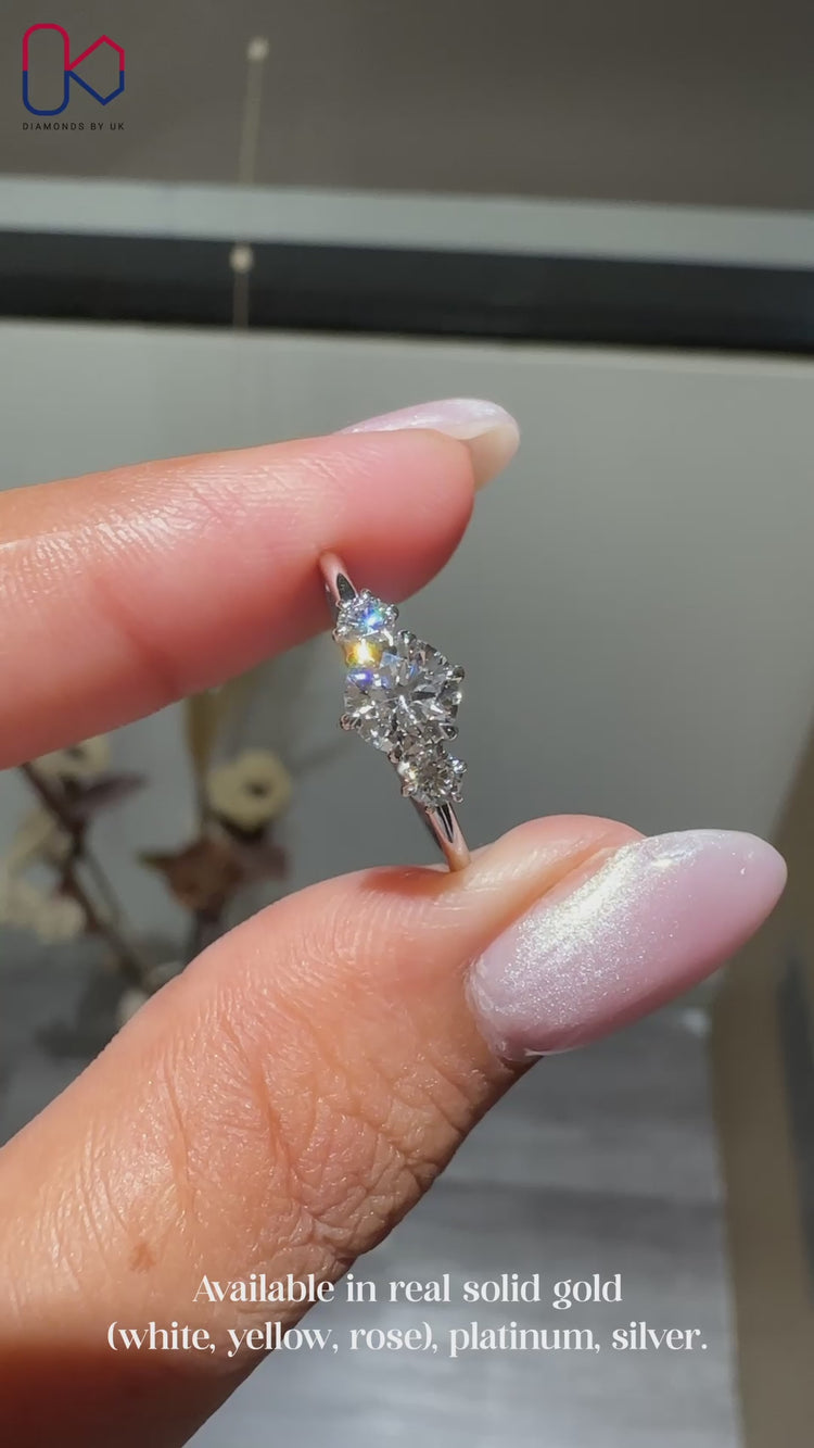 Handmade six claw prong diamond engagement ring.
