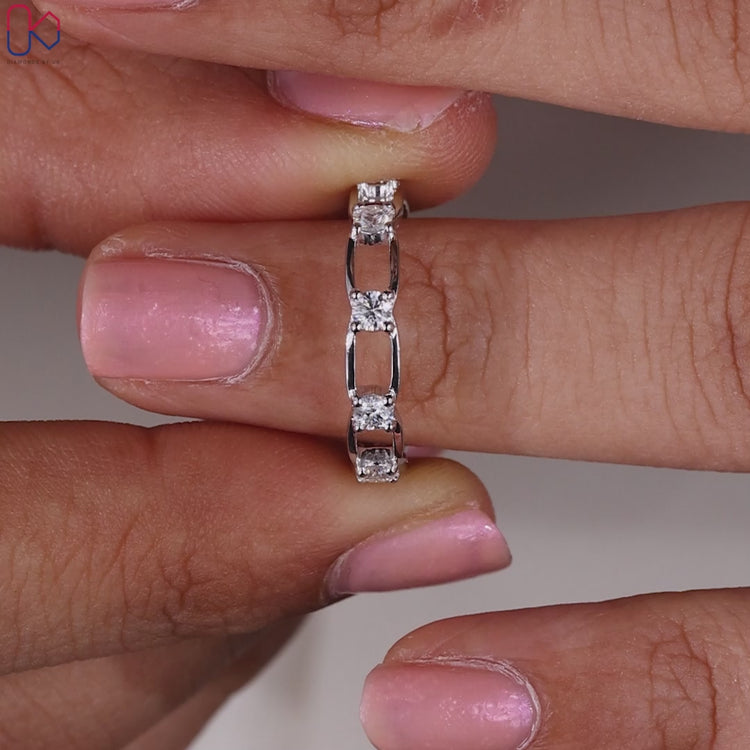 White gold wedding band crafted with prong set wedding band style.
