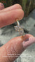 Round diamond ring with claw prong setting.
