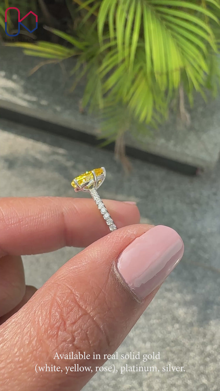 Yellow Pear Diamond Ring featuring a unique pear-shaped design.
