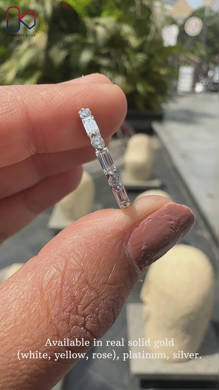 Elegant eternity wedding band featuring high-quality craftsmanship and a sleek finish.
