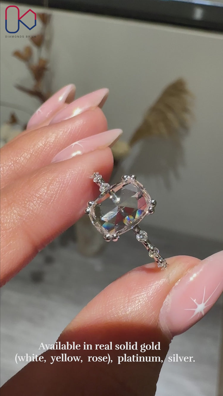 Antique Elongated Cushion Diamond Ring featuring a prong setting, perfect for an elegant engagement.
