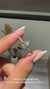 IGI Certified pear cut ring with heart prongs.