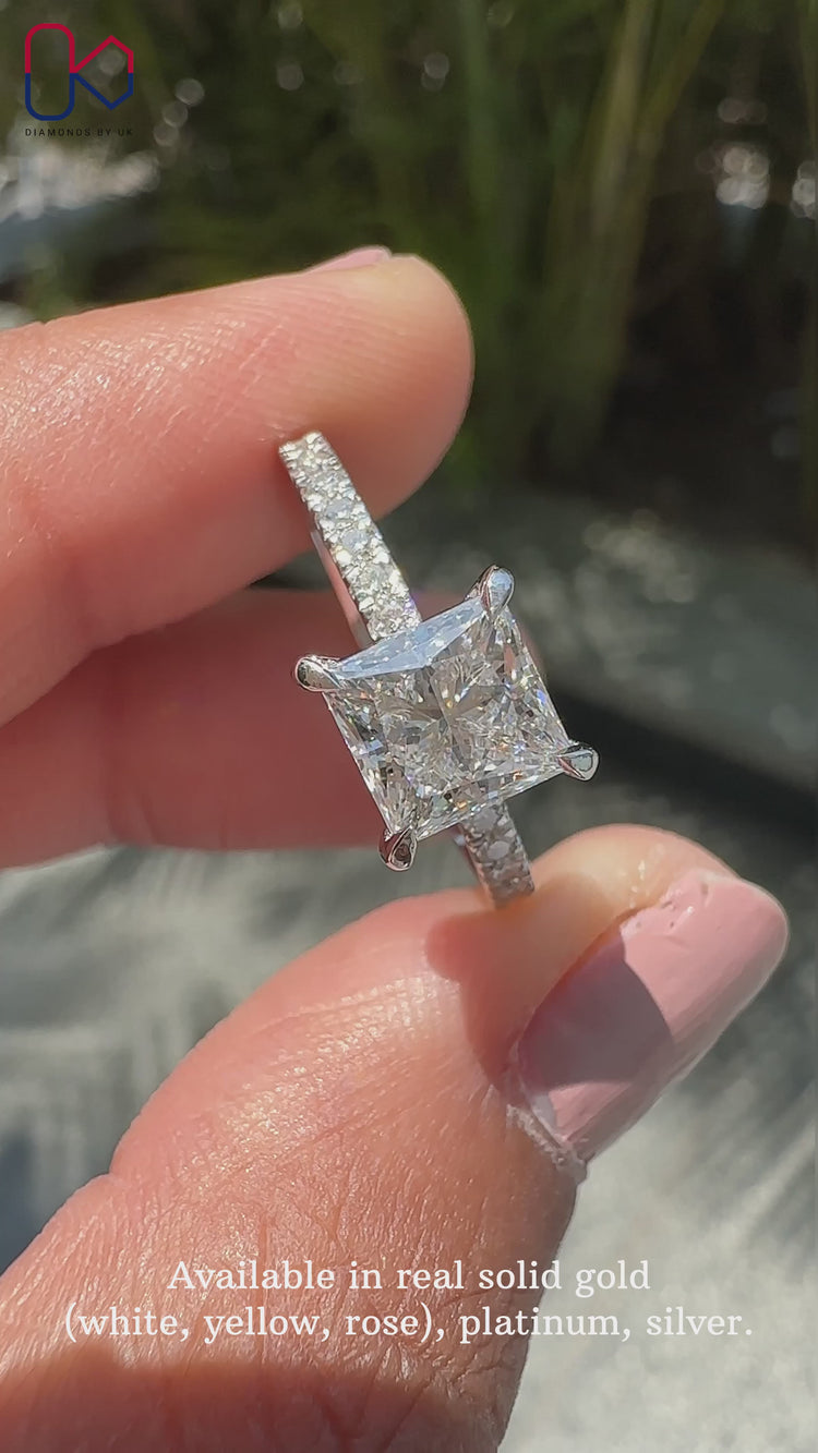 Round diamond pave set ring with white gold band.
