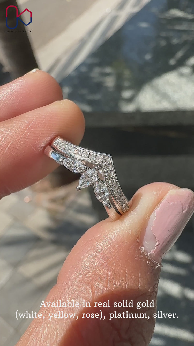 V shaped diamond wedding band featuring delicate prong-set diamonds
