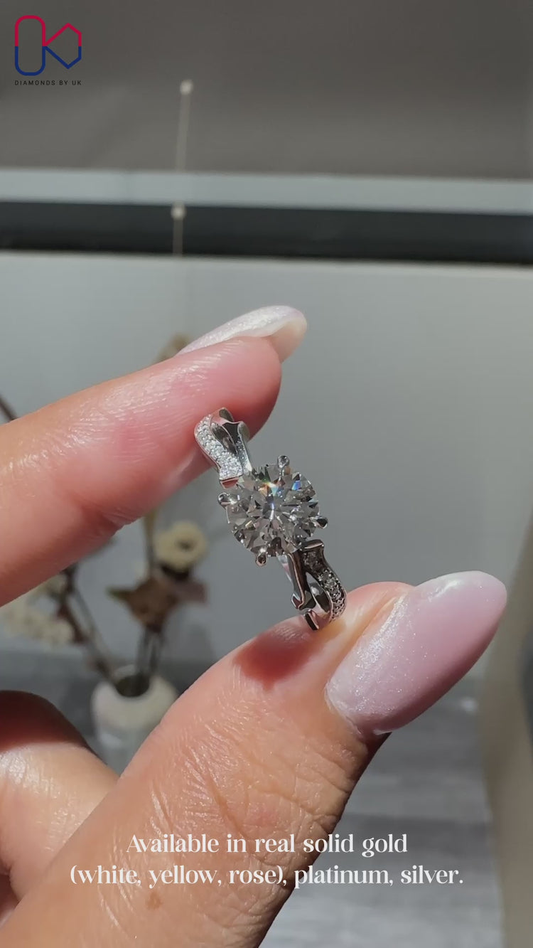 Handmade IGI Certified round cut diamond ring.
