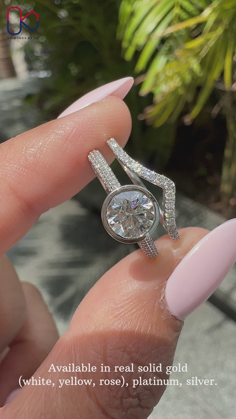 Bezel set engagement ring featuring a modern and elegant design.
