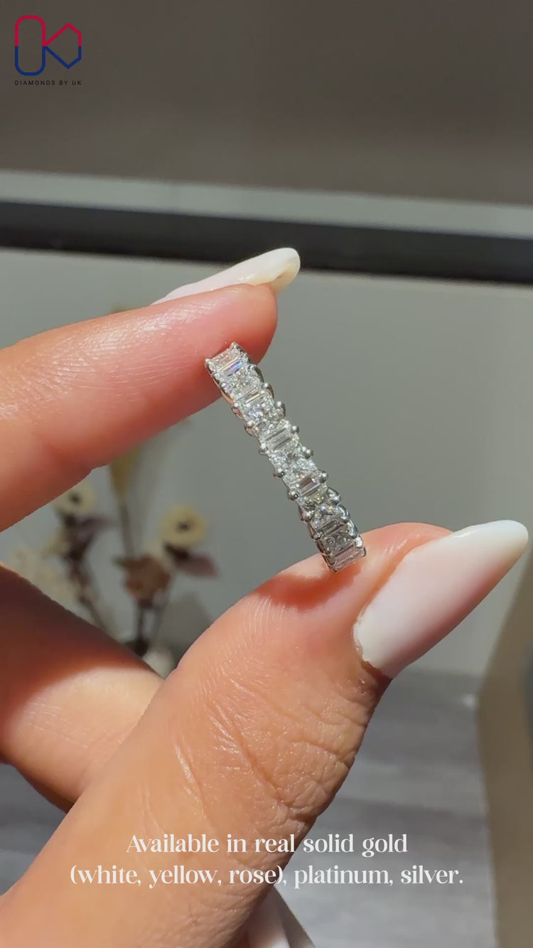 Half eternity wedding band with princess and baguette diamonds.

