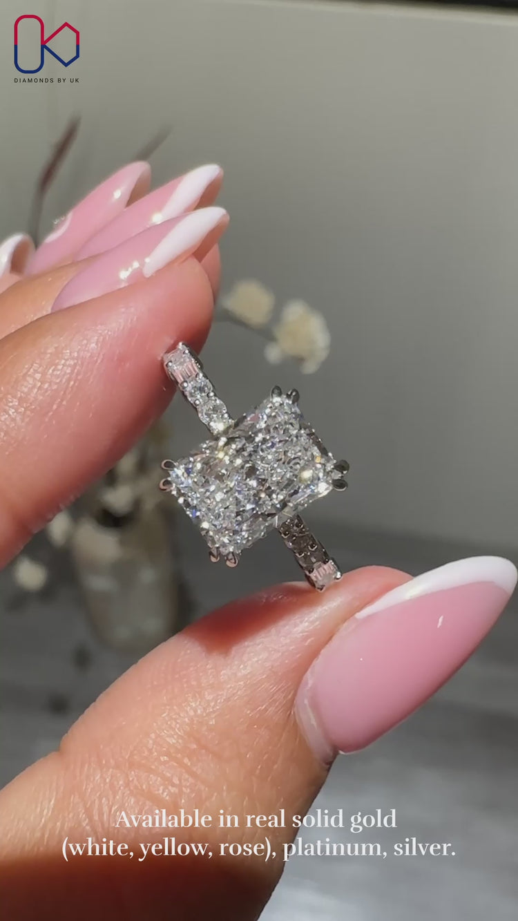 Diamond radiant cut ring with a double claw prong setting.
