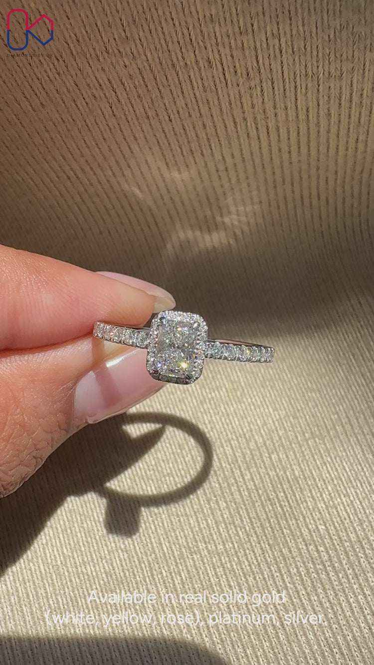 Radiant cut ring with round diamond pavé band.