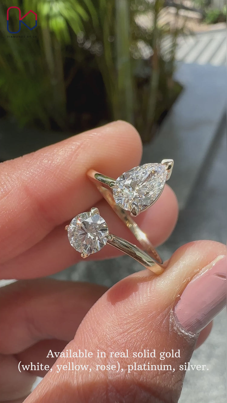 Pear and round diamond ring set in a two stone engagement ring.