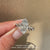 Marquise diamond ring with milgrain and cathedral setting.
