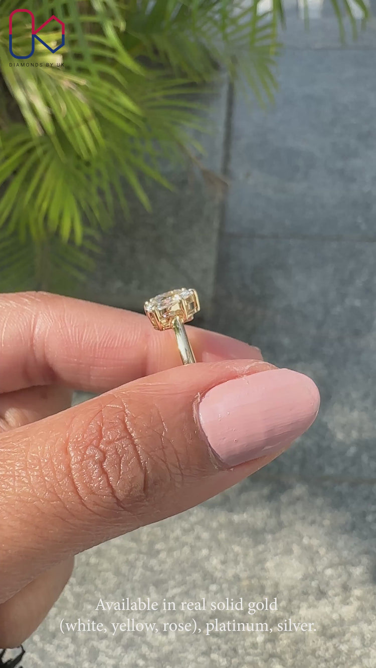 Toi et moi engagement ring with balanced and artistic design.
