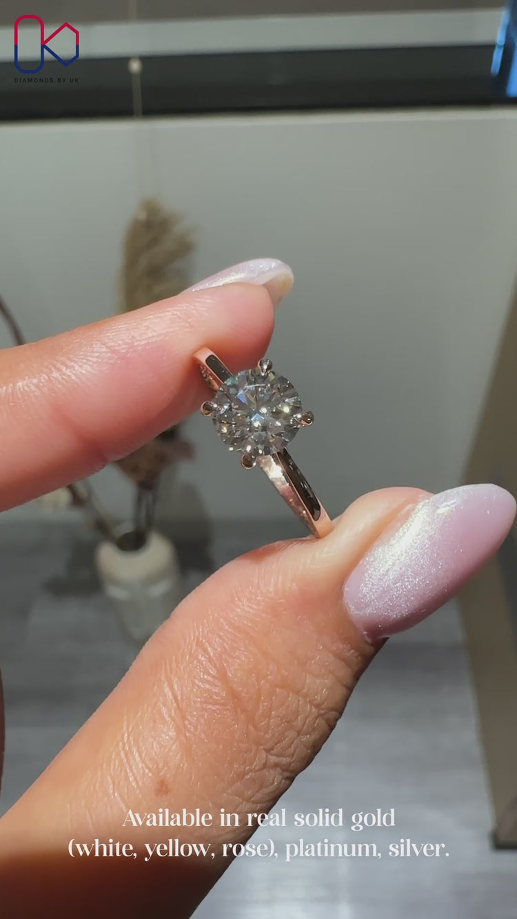 Diamondsbyuk rose gold diamond engagement ring.
