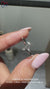 IGI Certified three stone ring with round diamond.
