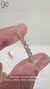 Elegant rose gold wedding band featuring sparkling round diamonds.
