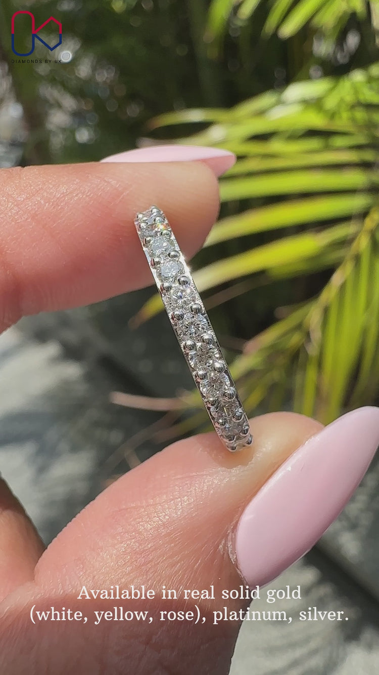 Half Eternity Band featuring sparkling round diamonds for a timeless design.
