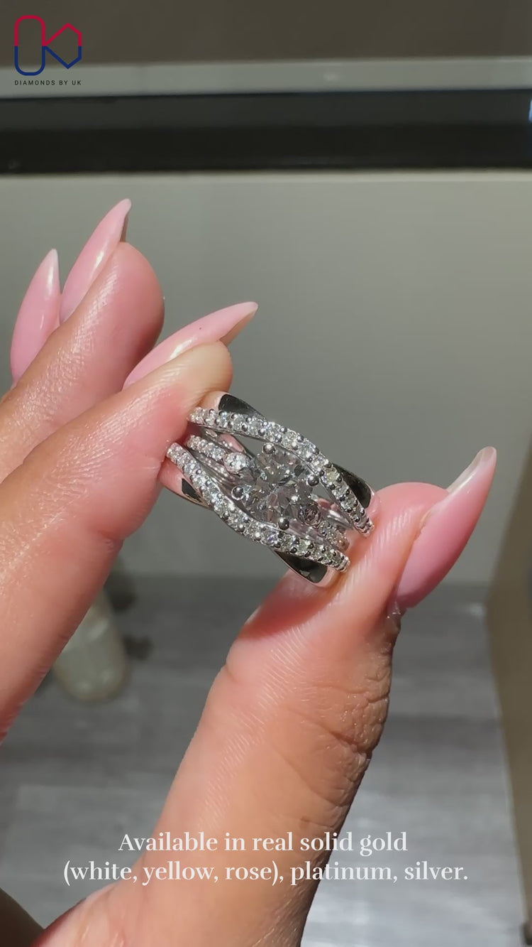 Round diamond ring with a polished band design.
