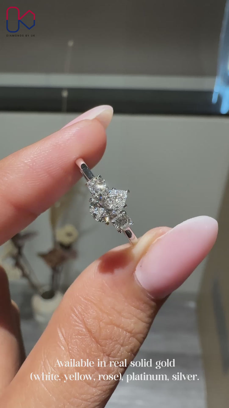 Pear diamond ring with secure claw prong setting.