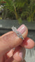 Round diamond band with infinity and twisted design.
