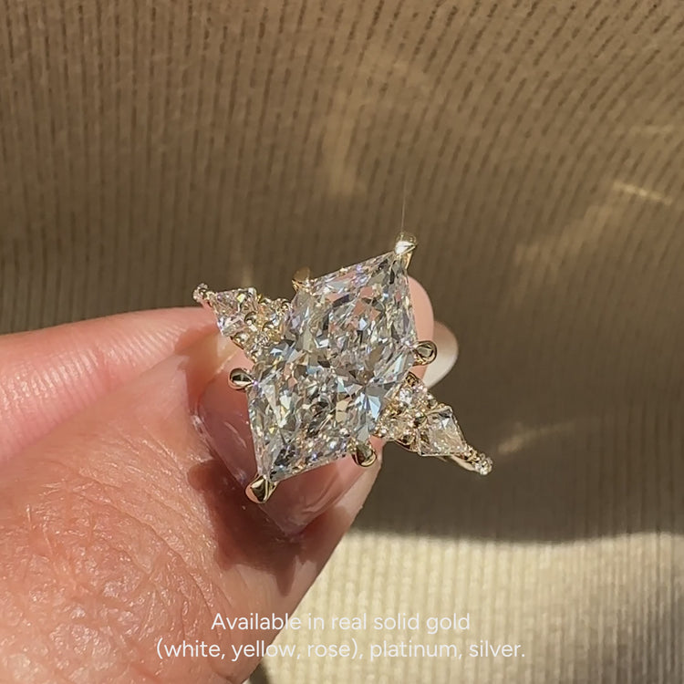 Diamondsbyuk Dutch marquise ring with kite side stones.  
