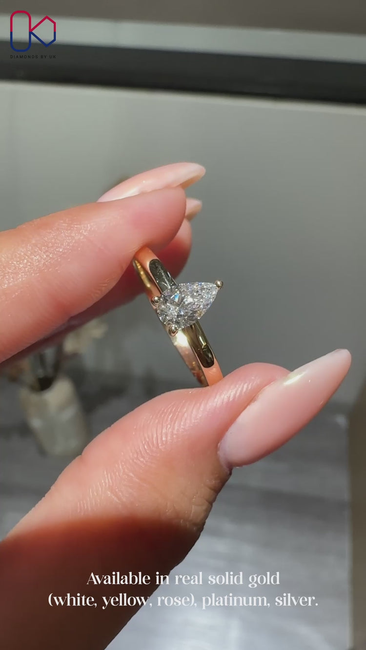 Pear cut diamond solitaire ring
