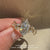 IGI certified lab grown marquise ring with side stones.
