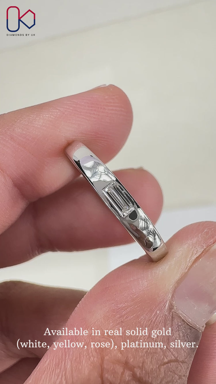 Baguette wedding band featuring dazzling stones in a classic arrangement.
