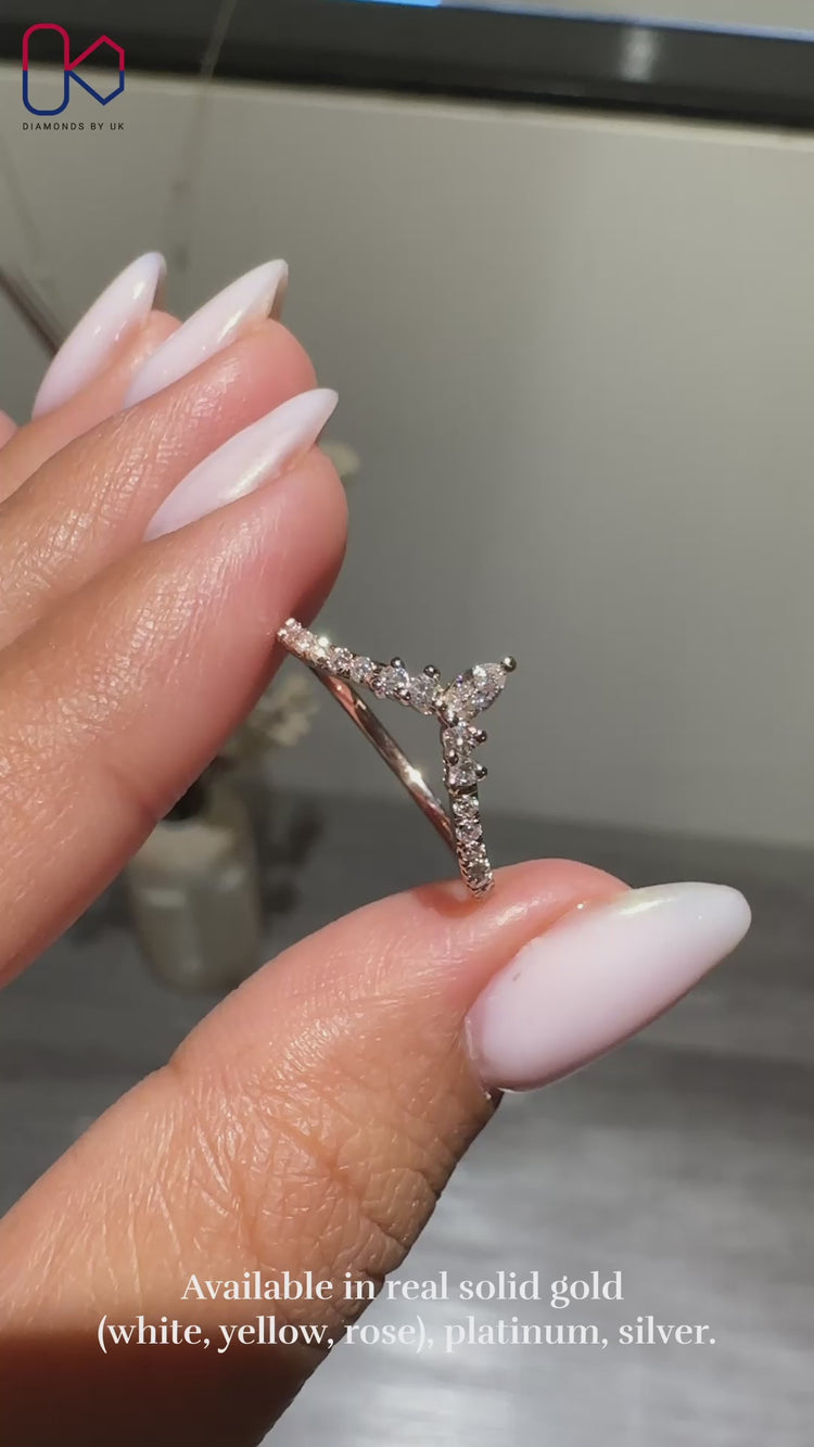 Marquise and round diamond band with a stunning sparkle.