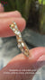 Round cut diamond band in yellow gold.
