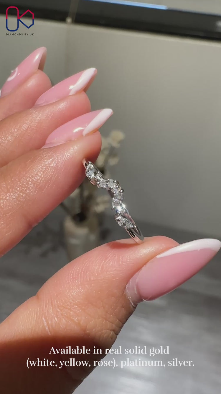 Chevron diamond band with stunning diamonds set in a stylish pattern.
