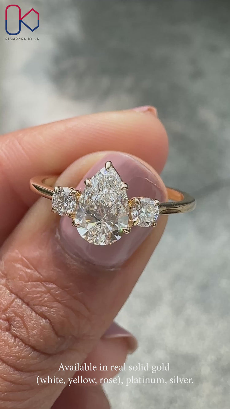 3 stone diamond ring featuring precision-cut diamonds and balanced proportions.
