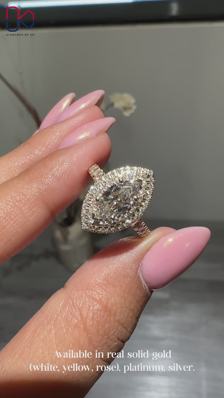 Marquise cut diamond ring in a unique and elegant design.
