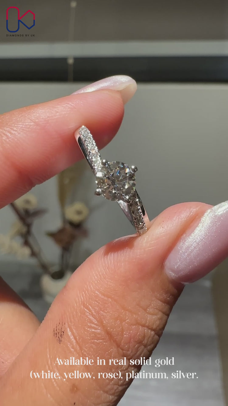 Handmade IGI Certified round cut diamond ring.