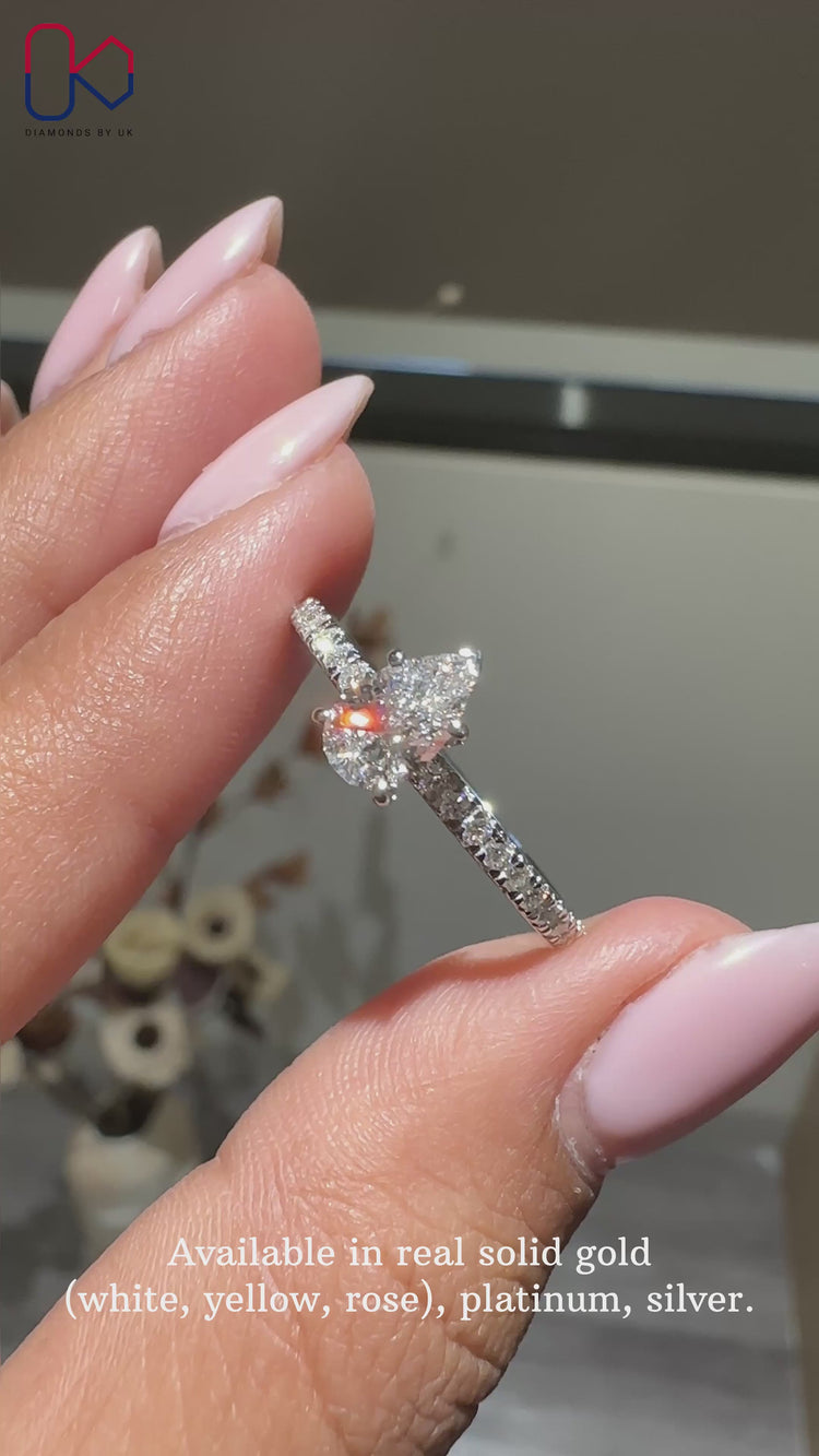 Custom lab grown pear cut diamond engagement ring.
