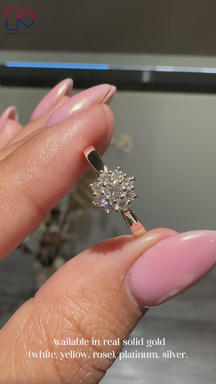 Tapered ring shank with a cluster diamond design.
