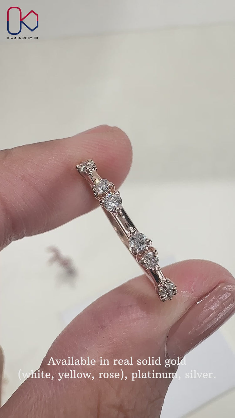 Elegant round diamond band with a sparkling diamond half eternity band.
