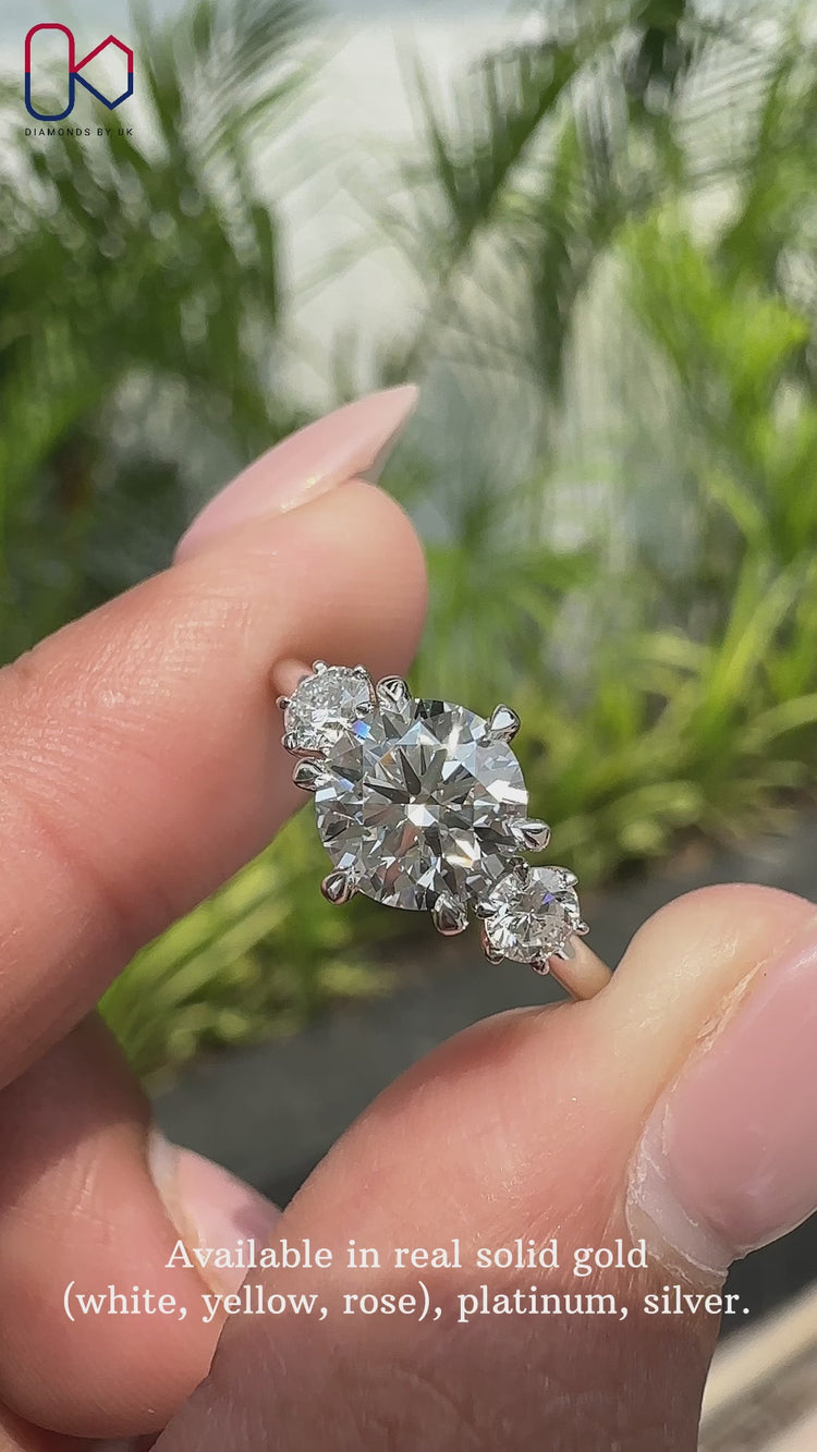 3 Stone Round Diamond Engagement Ring.
