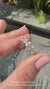 Handmade oval diamond band with prong set diamonds.
