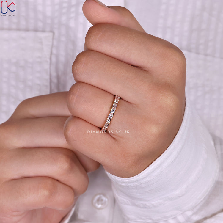 Lab grown diamond eternity band with prong setting.
