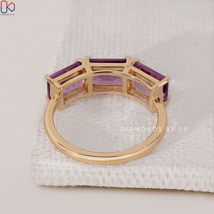 Custom engagement ring with amethyst and side diamonds