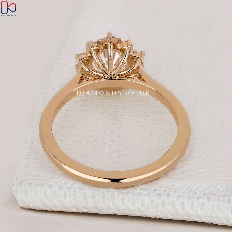 IGI Certified round diamond ring with four prongs.