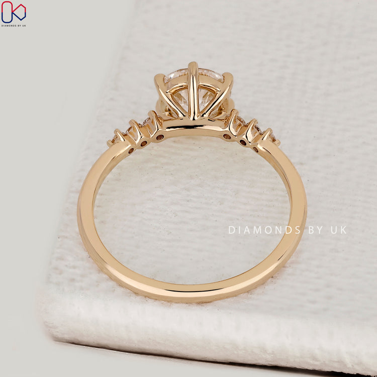 IGI Certified round cut seven stone diamond ring.